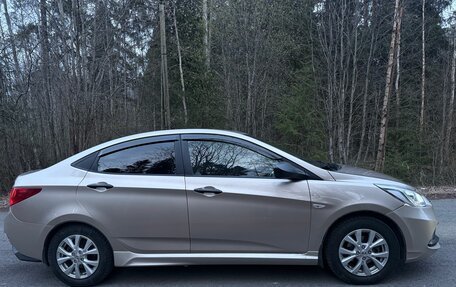 Hyundai Solaris II рестайлинг, 2011 год, 699 000 рублей, 4 фотография