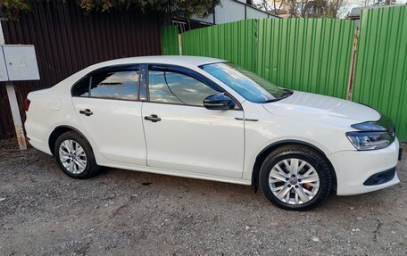 Volkswagen Jetta VI, 2014 год, 900 000 рублей, 2 фотография