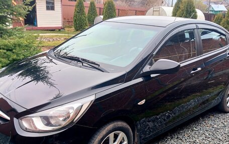 Hyundai Solaris II рестайлинг, 2013 год, 800 000 рублей, 10 фотография