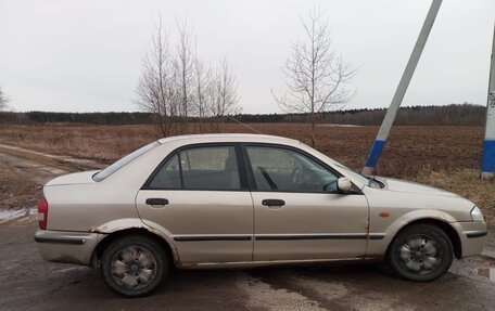 Mazda 323, 1998 год, 100 000 рублей, 6 фотография
