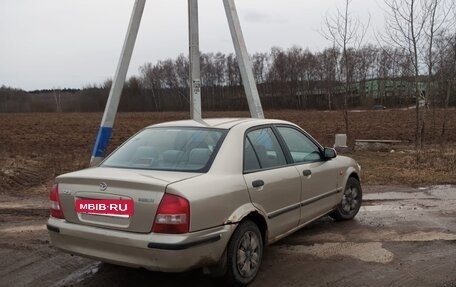 Mazda 323, 1998 год, 100 000 рублей, 8 фотография