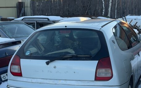 Mitsubishi Mirage VI рестайлинг, 2003 год, 3 фотография