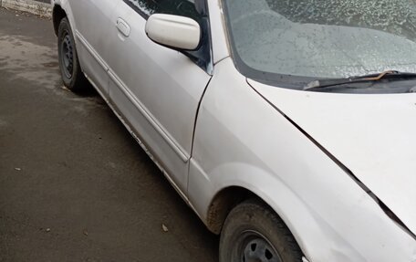Mazda Familia Y10, 1998 год, 130 000 рублей, 2 фотография