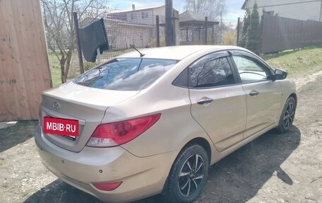 Hyundai Solaris II рестайлинг, 2011 год, 595 000 рублей, 4 фотография