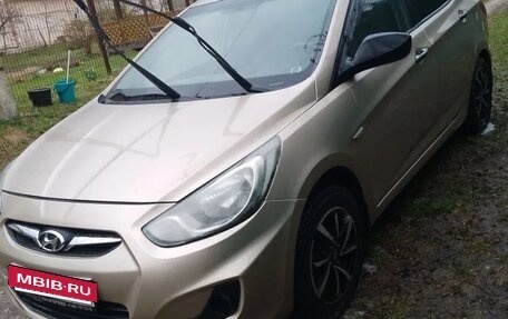 Hyundai Solaris II рестайлинг, 2011 год, 595 000 рублей, 3 фотография