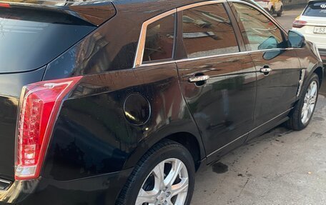 Cadillac SRX II рестайлинг, 2011 год, 999 000 рублей, 1 фотография