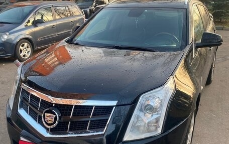 Cadillac SRX II рестайлинг, 2011 год, 999 000 рублей, 2 фотография