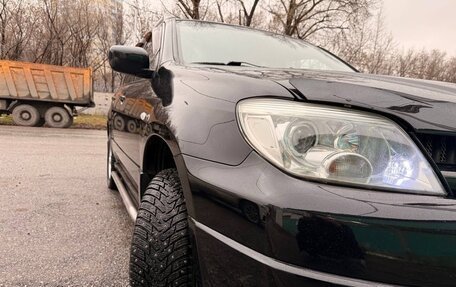 Mitsubishi Outlander III рестайлинг 3, 2007 год, 670 000 рублей, 3 фотография