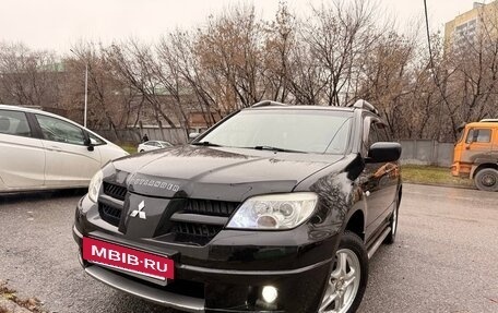 Mitsubishi Outlander III рестайлинг 3, 2007 год, 670 000 рублей, 2 фотография
