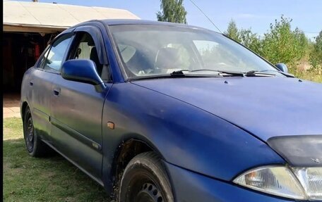 Mitsubishi Carisma I, 1998 год, 240 000 рублей, 3 фотография