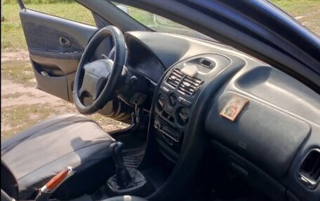 Mitsubishi Carisma I, 1998 год, 240 000 рублей, 12 фотография