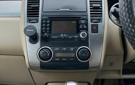 Nissan Tiida, 2010 год, 879 000 рублей, 20 фотография