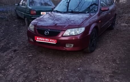 Mazda 323, 2003 год, 130 000 рублей, 10 фотография