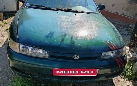 Mazda 626, 1994 год, 14 фотография