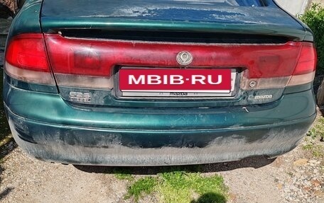 Mazda 626, 1994 год, 15 фотография