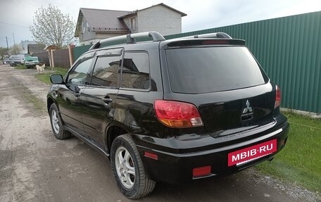 Mitsubishi Outlander III рестайлинг 3, 2004 год, 800 000 рублей, 4 фотография