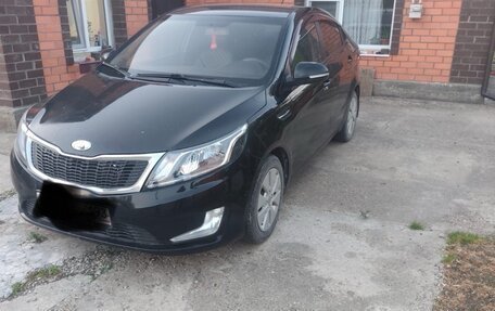 KIA Rio III рестайлинг, 2013 год, 550 000 рублей, 2 фотография