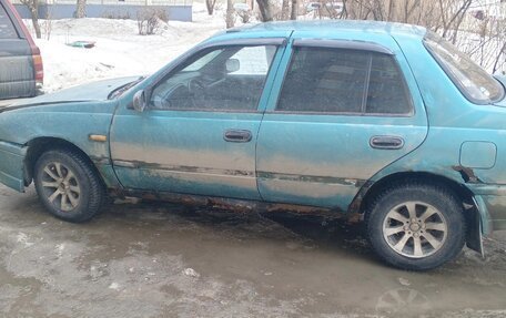Nissan Sunny N14, 1994 год, 150 000 рублей, 3 фотография
