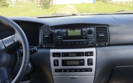 Toyota Corolla, 2005 год, 600 000 рублей, 5 фотография