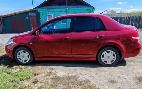 Nissan Tiida, 2010 год, 700 000 рублей, 8 фотография