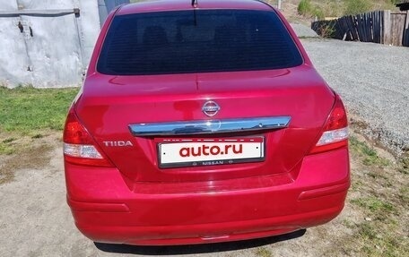 Nissan Tiida, 2010 год, 700 000 рублей, 7 фотография