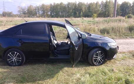 KIA Cerato III, 2011 год, 700 000 рублей, 1 фотография
