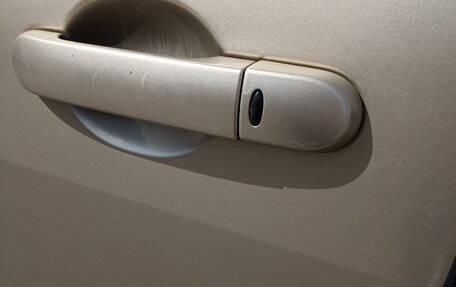 Nissan Tiida, 2009 год, 740 000 рублей, 30 фотография