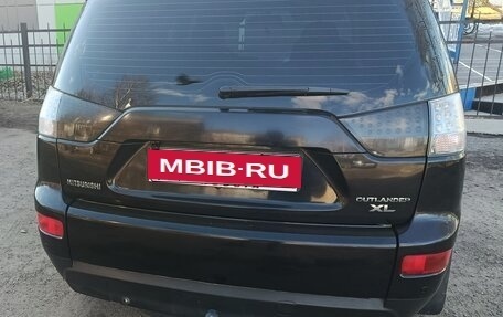 Mitsubishi Outlander III рестайлинг 3, 2007 год, 990 000 рублей, 2 фотография
