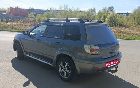 Mitsubishi Outlander III рестайлинг 3, 2004 год, 600 000 рублей, 4 фотография