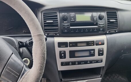 Toyota Corolla, 2004 год, 550 000 рублей, 11 фотография