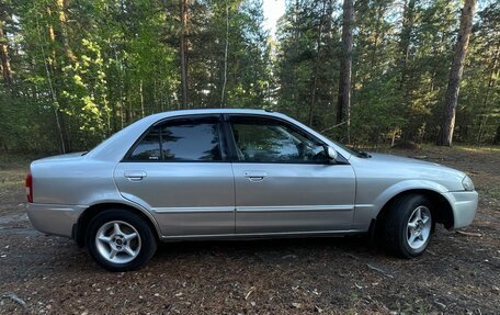 Mazda Familia, 1999 год, 270 000 рублей, 9 фотография