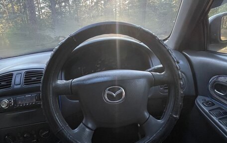 Mazda Familia, 1999 год, 270 000 рублей, 13 фотография