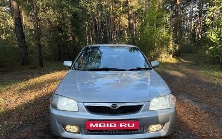 Mazda Familia, 1999 год, 270 000 рублей, 2 фотография