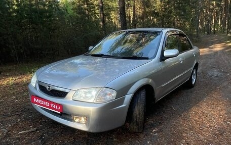 Mazda Familia, 1999 год, 270 000 рублей, 3 фотография