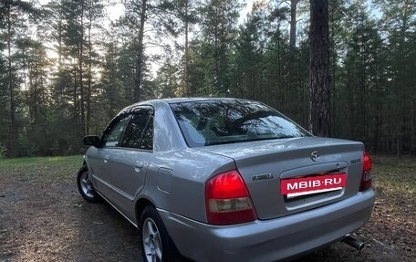 Mazda Familia, 1999 год, 270 000 рублей, 5 фотография