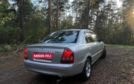 Mazda Familia, 1999 год, 270 000 рублей, 6 фотография
