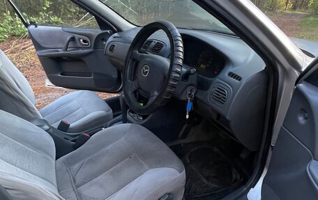 Mazda Familia, 1999 год, 270 000 рублей, 23 фотография