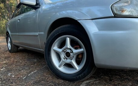Mazda Familia, 1999 год, 270 000 рублей, 36 фотография