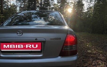 Mazda Familia, 1999 год, 270 000 рублей, 34 фотография