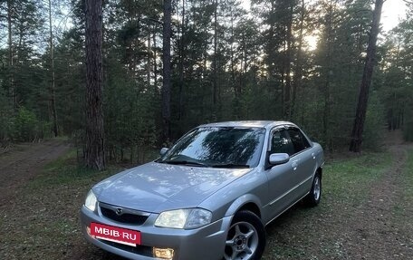 Mazda Familia, 1999 год, 270 000 рублей, 38 фотография