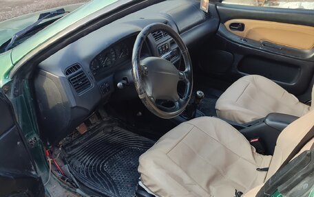 Mazda 323, 1998 год, 50 000 рублей, 6 фотография