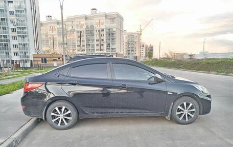 Hyundai Solaris II рестайлинг, 2011 год, 630 000 рублей, 4 фотография