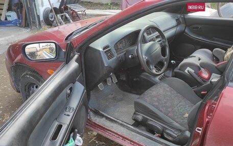 Mazda 323, 1997 год, 150 000 рублей, 5 фотография