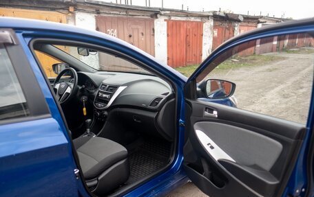 Hyundai Solaris II рестайлинг, 2011 год, 870 000 рублей, 32 фотография