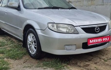 Mazda Familia, 2003 год, 219 000 рублей, 24 фотография