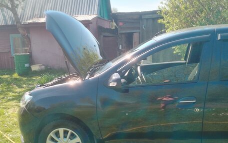 Renault Logan II, 2014 год, 648 000 рублей, 24 фотография