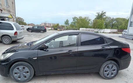 Hyundai Solaris II рестайлинг, 2011 год, 350 000 рублей, 6 фотография