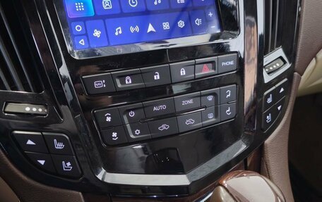 Cadillac SRX II рестайлинг, 2012 год, 1 399 000 рублей, 19 фотография