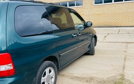 KIA Carnival III, 2005 год, 590 000 рублей, 4 фотография