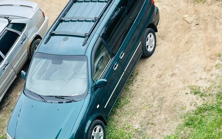 KIA Carnival III, 2005 год, 590 000 рублей, 18 фотография